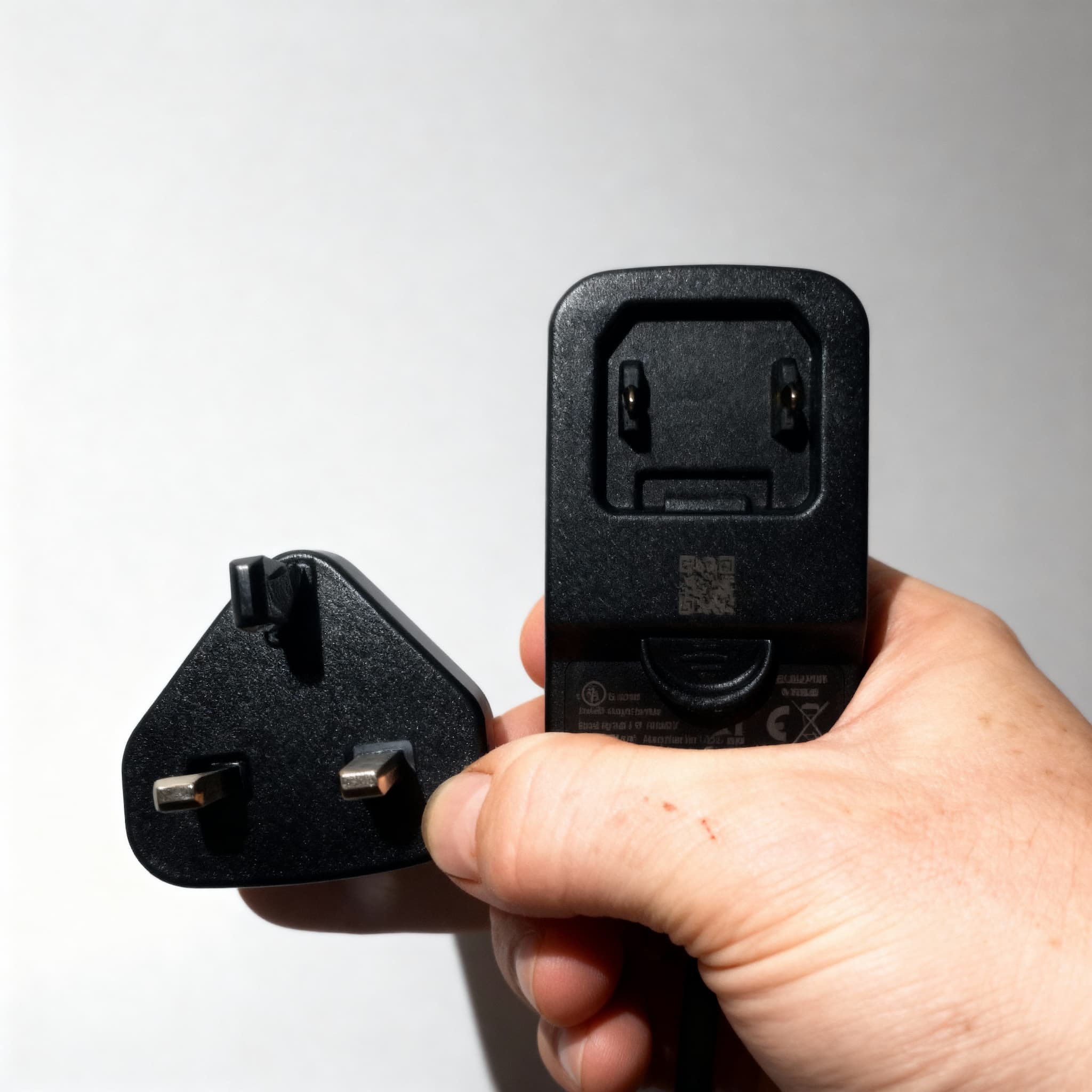 Universal power supply with UK three pin adapter